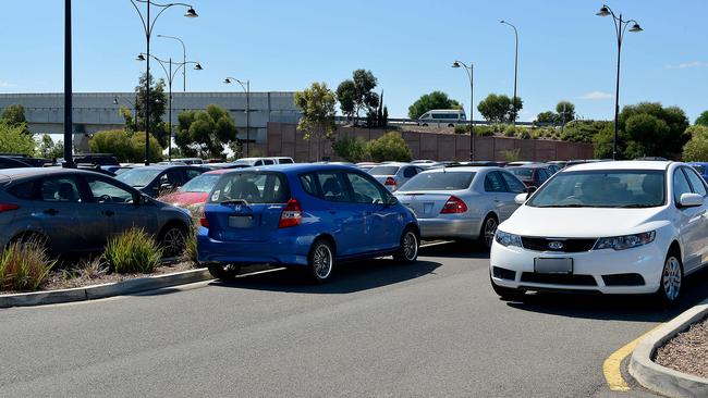 Cars park illegally at the Mawson Lakes Railway station carpark due to overcrowding. Picture: Bianca De Marchi