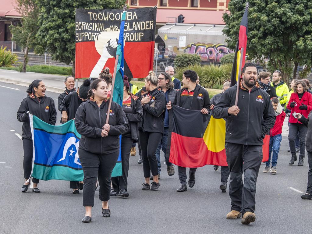 Hannah Ward and Nathan Gaulton leads the NAIDOC Week march in Toowoomba. Monday, July 4, 2022. Picture: Nev Madsen.