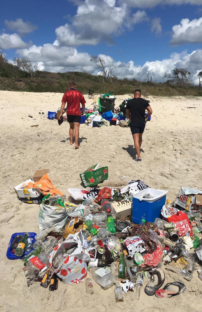 Byron Bay locals left to clean up after a massive beach party. Picture: Ivan Saric