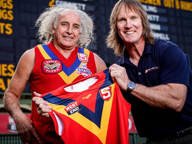 State game live stream preview: Former SA footballers John Platten and Greg Anderson Wednesday May 12, 2021, John Platten is wearing an old jumper with Greg holding Saturdays version - pic Mike Burton