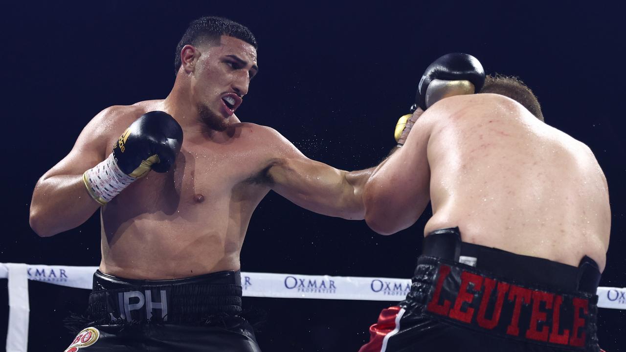 Justis Huni punches Kiki Toa Leutele during the bout last week. (Photo by Chris Hyde/Getty Images)