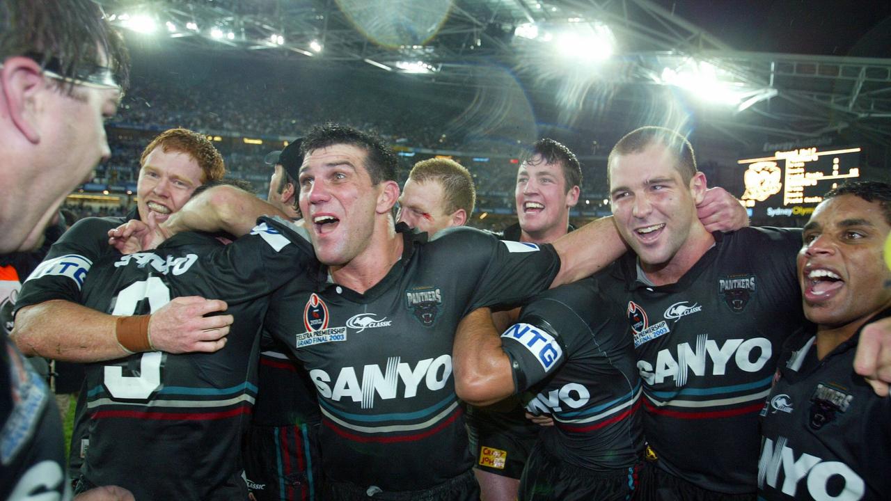 Scott Sattler celebrates with teammates after Penrith Panthers defeated Sydney Roosters in 2003 NRL Grand Final.