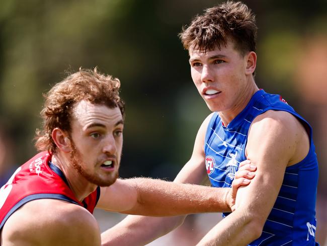 MELBOURNE, AUSTRALIA - FEBRUARY 22: Finn O'Sullivan of the Kangaroos and Jed Adams of the Demons compete during the 2025 AFL match simulation between the North Melbourne Kangaroos and Melbourne Demons at Arden Street on February 22, 2025 in Melbourne, Australia. (Photo by Dylan Burns/AFL Photos via Getty Images)