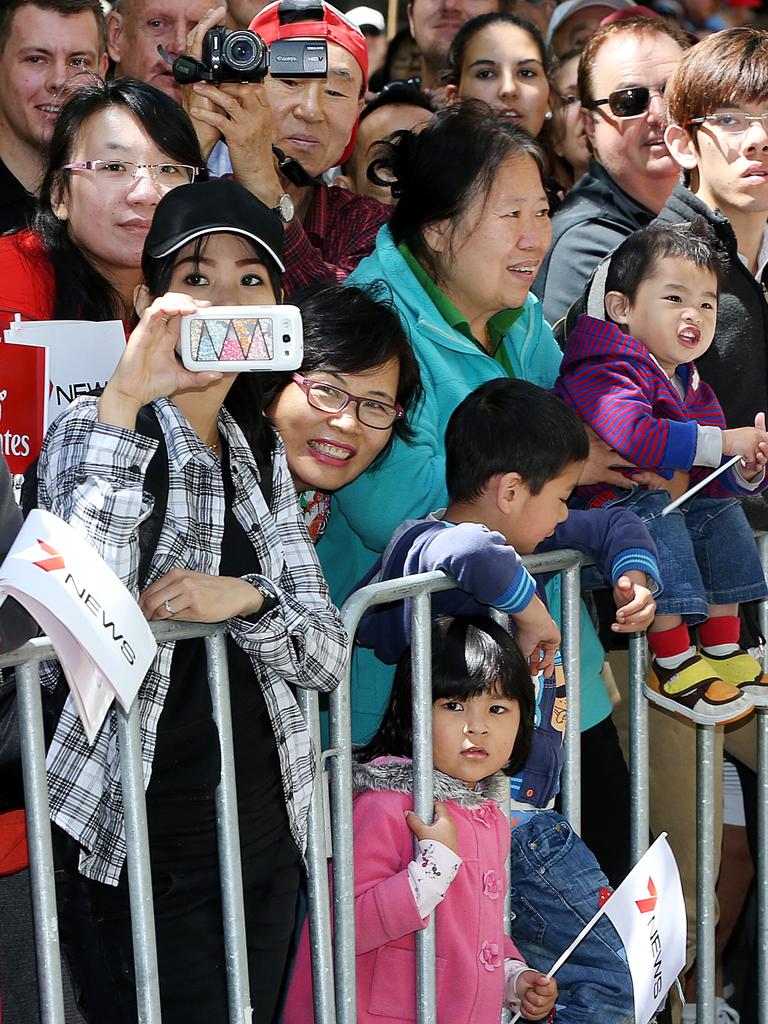 Melbourne Cup Parade. Some of the crowd watches the passing parade. Picture: Ian Currie