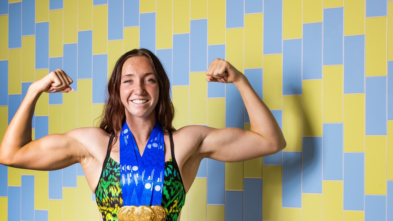 Lani Pallister shows off her world short course swimming gold medals. Picture: Nigel Hallett.