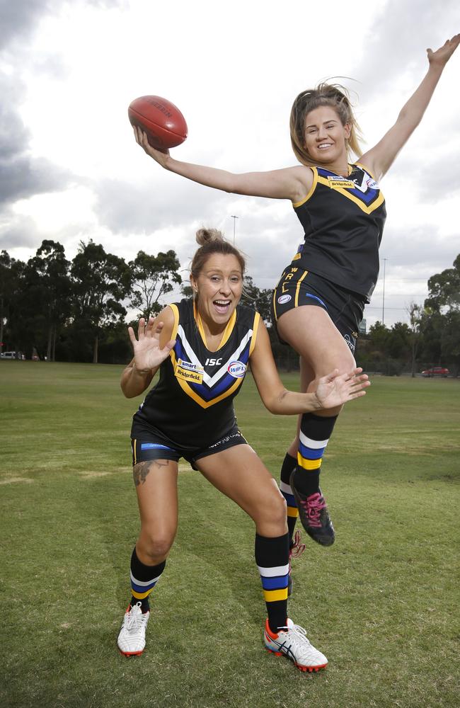 Footy WAGS turned players: Haylea Cooney, wife of former Bulldog and Bomber Adam, with Gilmore in their Caroline Springs gear. Picture: David Caird