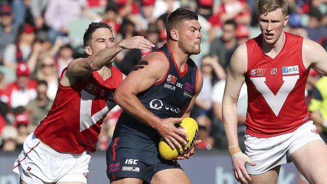 Norwood’s Mitch Grigg tries to muscle away from North’s Thomas Schwarz. Picture: Sarah Reed