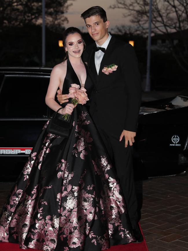 Lucy Griffiths, 17, and Logan Turner, 17, at the Ormeau Woods School formal at Links Resort, Hope Island. Picture: Glenn Hampson