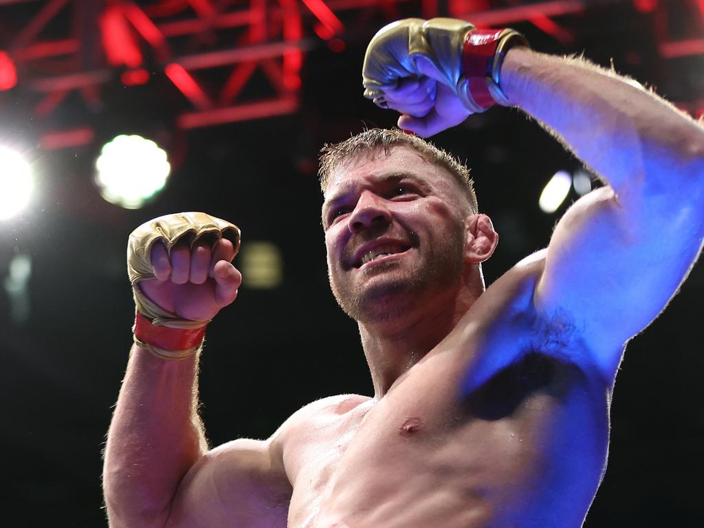 PERTH, AUSTRALIA - AUGUST 18: Dricus Du Plessis of South Africa celebrates winning his fight against Israel Adesanya of Nigeria by submission during UFC 305 at RAC Arena on August 18, 2024 in Perth, Australia. (Photo by Paul Kane/Getty Images)