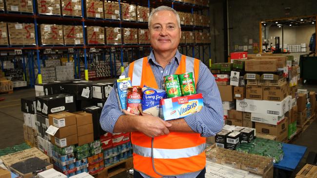 Food bank Victoria chief executive Dave McNamara at the organisation’s Yarraville warehouse. Picture: Mark Wilson