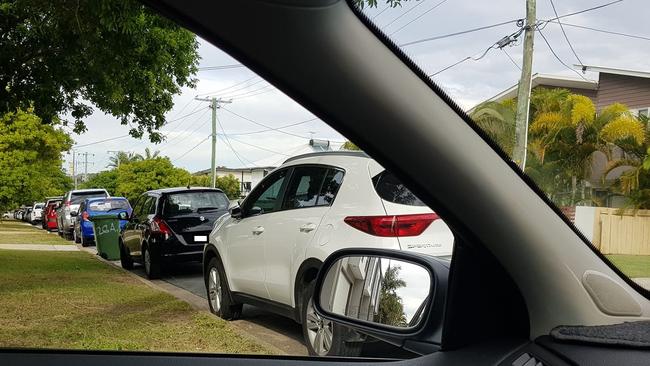 Shane Christall took this photo – highlighting how hard it can be to get out his driveway to due the number of people parking in streets surrounding the hospital.