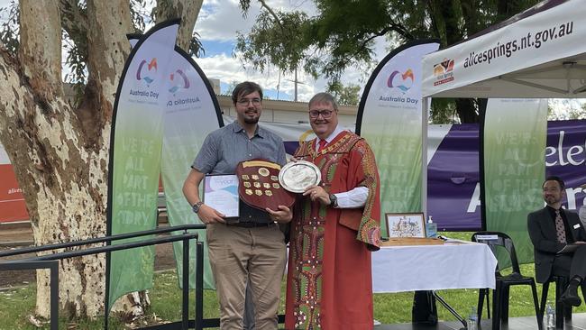 Declan Miller (left) receives his award for 2021 Young Centralian of the Year from Alice Springs Mayor Damien Ryan. Picture: Daniel Wood