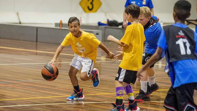 Junior basketball players at the school holiday camp at North Gold Coast Seahawks. Picture: Jerad Williams