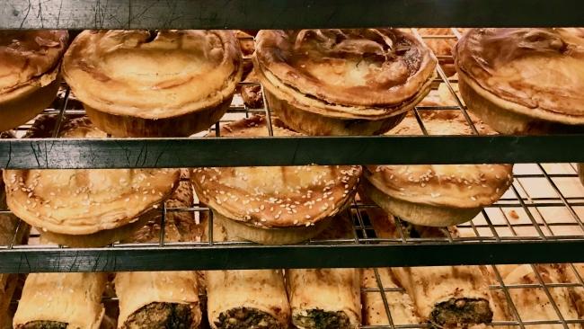 A selection of pies and sausage rolls at Bourke Street Bakery. Picture: Jenifer Jagielski