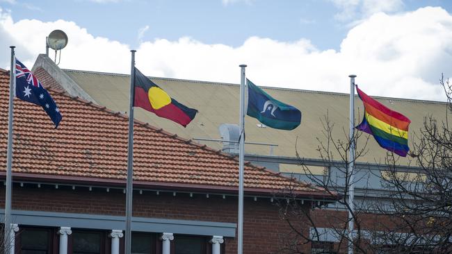 The Australian, Aboriginal, Torres Strait Islander and the LGBTI pride flags flying high at Moreland Civic Centre. Picture: Eugene Hyland