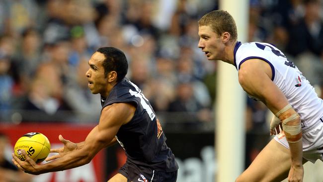 Eddie Betts beats Zac Dawson to the footy before kicking the goal. Picture: Wayne Ludbey