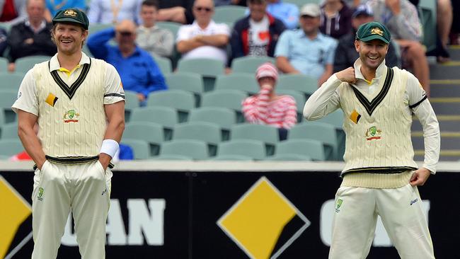 Australia's captain Michael Clarke, back, reacts with fellow team member  Shane Watson, front, after defeating Pakistan during the one day  international cricket match between Pakistan and Australia in Abu Dhabi,  United Arab