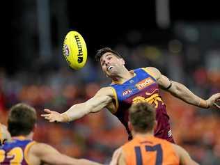 LINING UP: Brisbane's Marcus Adams in action against the Giants. Picture: Philip Hillyard