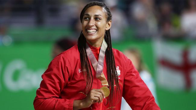 England and Sunshine Coast Lightning goalkeeper Geva Mentor with her gold medal from the Commonwealth Games. Picture: Getty Images