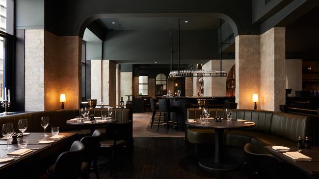 Moody and masculine: the main dining room has been opened up.