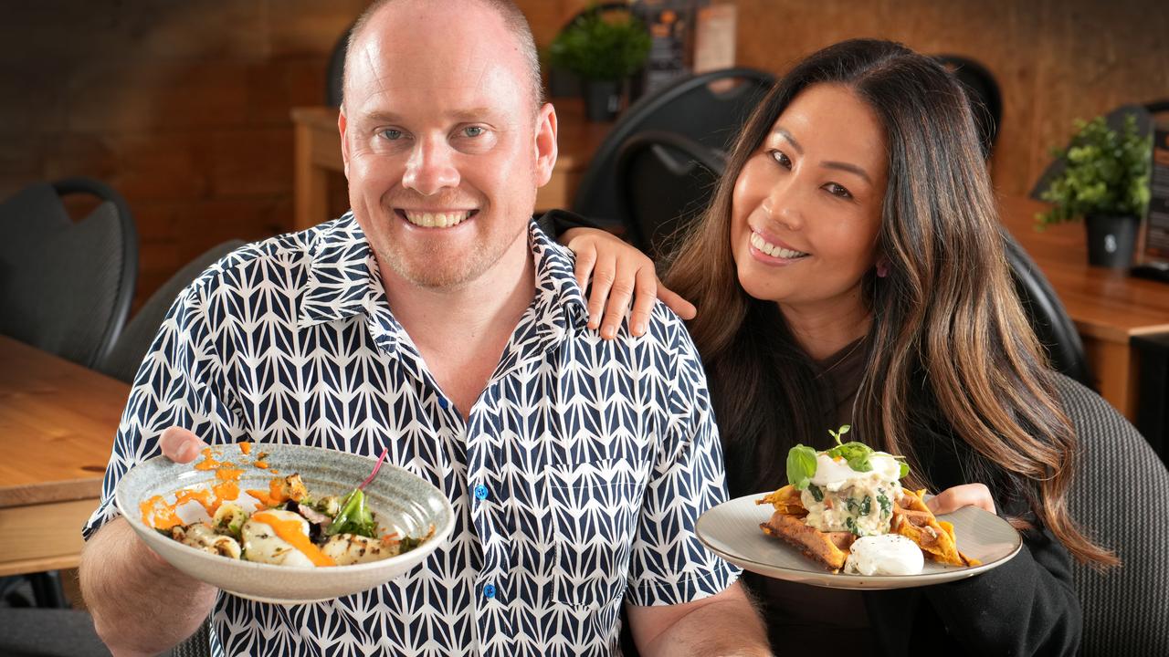 Foodie influencer Ben Holmes and partner Lanna Jompang, surrounded by food at The Pangaea Kitchen. Picture: Dean Martin