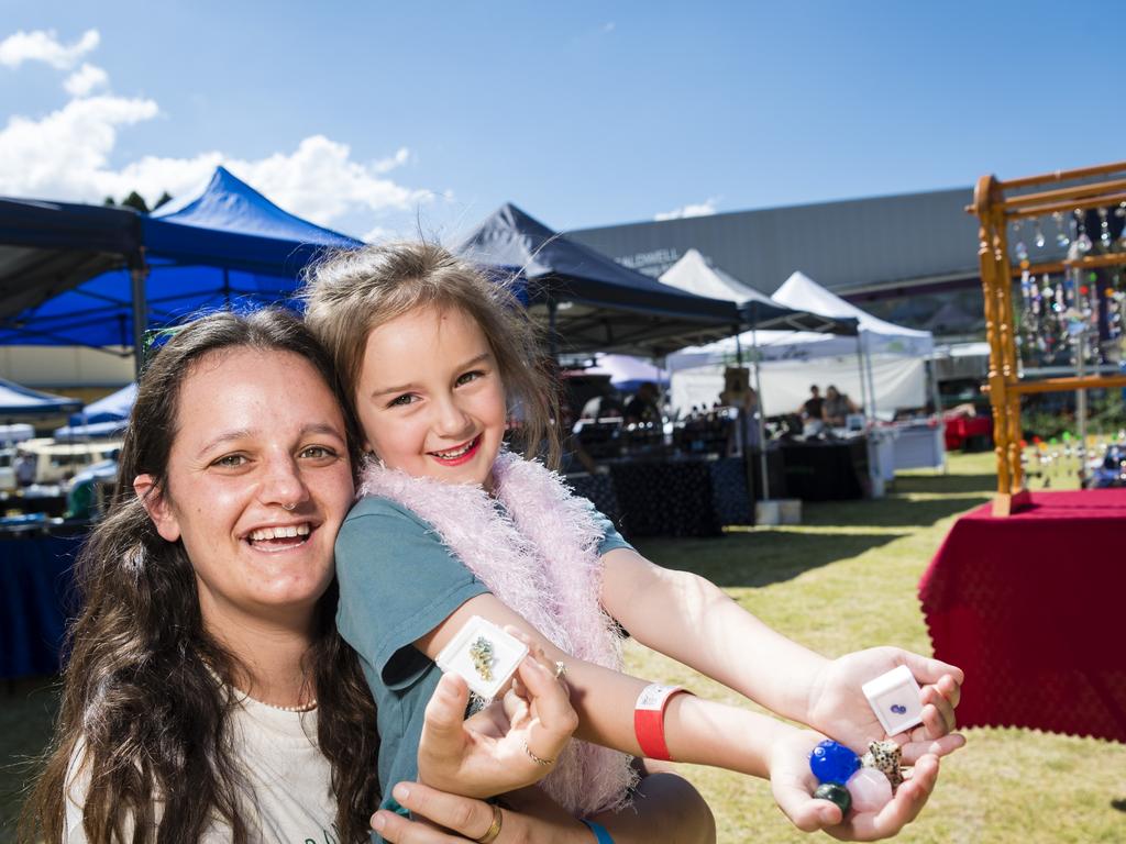 Macey Shinohara and mum Maddy Grace show their purchases from Gemfest hosted by Toowoomba Lapidary Club at Centenary Heights State High School, Saturday, October 21, 2023. Picture: Kevin Farmer