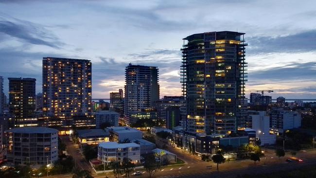 Dramatic clouds soften the structure of downtown Darwin in this great night shot. Picture: Pete Bonner