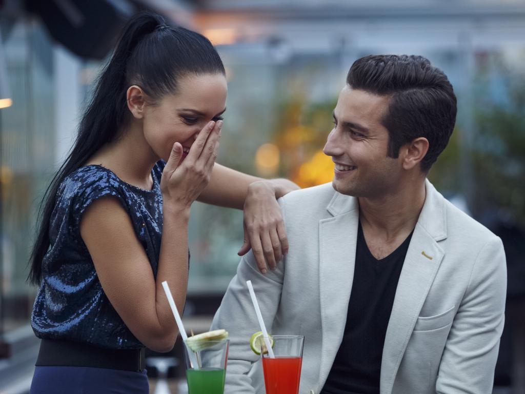 Young couple having fun in a club