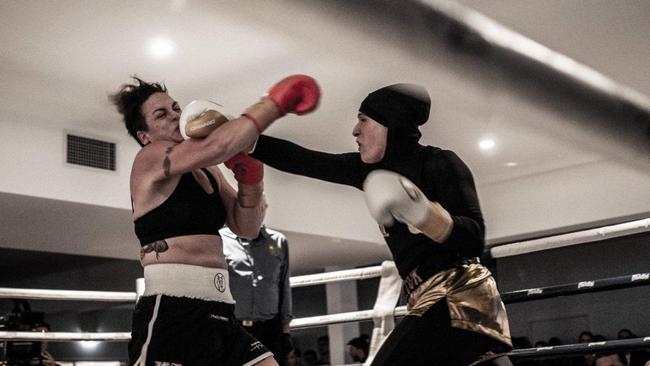 Malakay Moukyaber (right) competes against Donna Sadler for the Australian super welterweight championship in March.