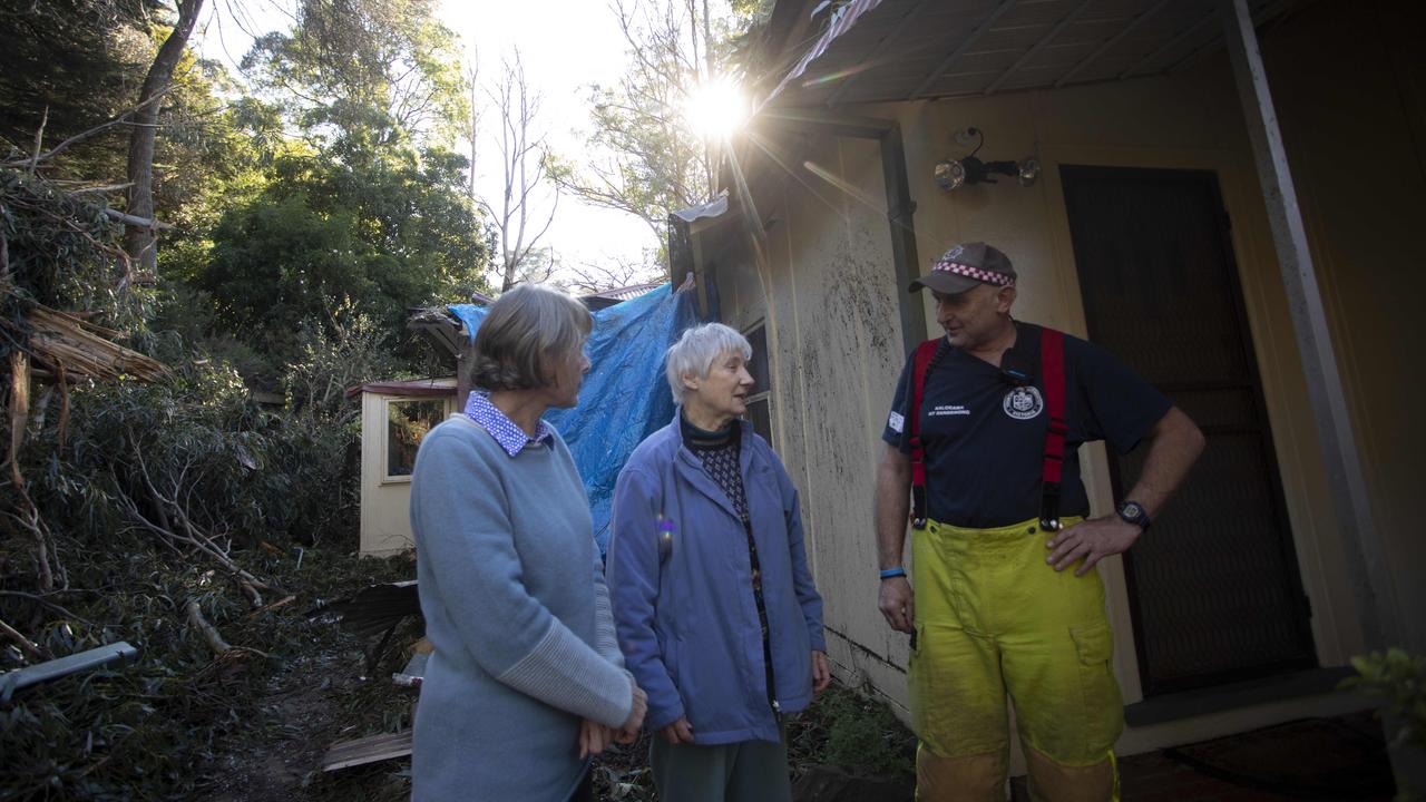 CFA volunteer Shayne O'Dwyer (right) speaks to Kalorama Lyn Osbourne (centre) and Nancy Wallace (left). Picture: Arsineh Houspian