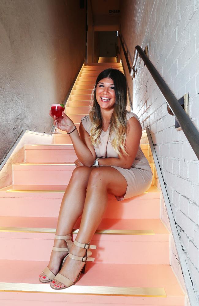 Krystal Mizzi in Melbourne’s prettiest stairwell at Peaches. Picture: Rebecca Michael