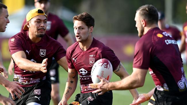 Kalyn Ponga gets a pass away during a Queensland training session on Thursday. Picture: Bradley Kanaris/Getty Images