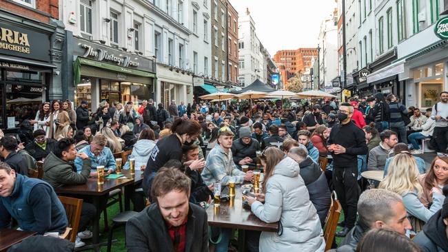 Crowds of people in restaurants and bars in Soho, London, where outdoor seating is allowed following a lift in Covid restrictions. Picture: Getty