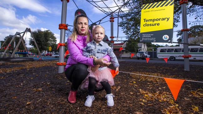 Lana Wilson and daughter Anetta, 3, at the park where Anetta is still not permitted to play. Picture: Wayne Taylor