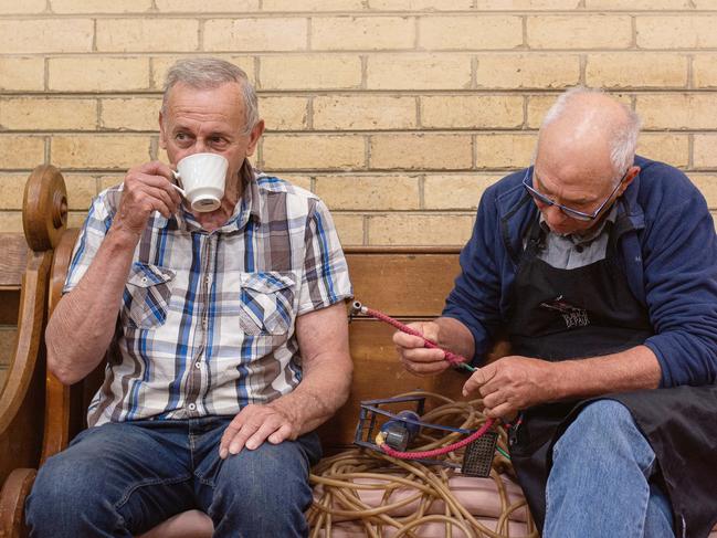 EMBARGO FOR TWAM 14 DEC 2019NO REUSE WITHOUT PERMISSION FEE APPLIESBendigo, Victoria Saturday November 16 2019Bernie Slater with repairer Peter Morison. Bernie brought in his old tire pump for repair.Bendigo Repair Cafe, where the community comes togetehr to help repair and restore broken and worn out household items and clothing.Photo by Josh RobenstoneStory by Fiona Harari