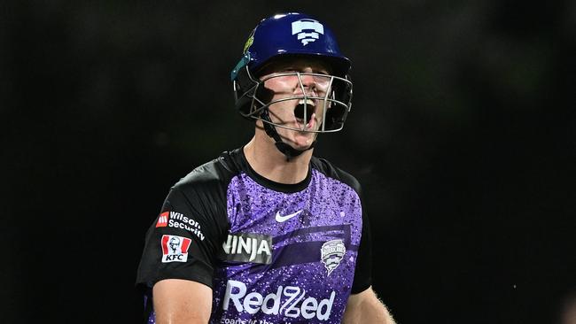 HOBART, AUSTRALIA - JANUARY 27: Mitch Owen of the Hurricanes celebrates scoring a century during the BBL The Final match between Hobart Hurricanes and Sydney Thunder at Ninja Stadium on January 27, 2025 in Hobart, Australia. (Photo by Steve Bell/Getty Images)