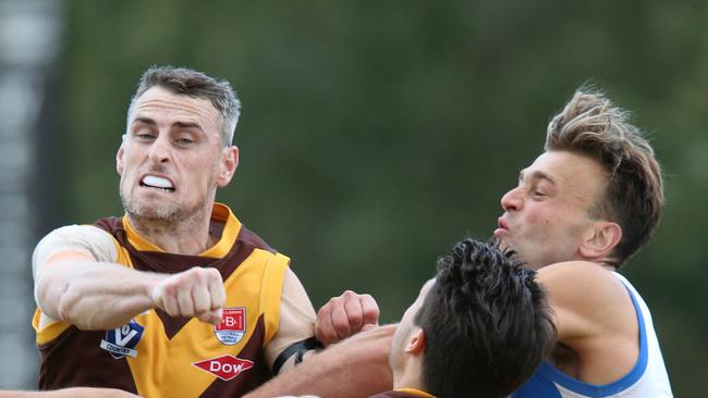 Drysdale’s Tim Delaney and Andrew Crosbie and Anglesea’s Jordan Keras contest for the ball in Round 3. Picture: Mark Wilson