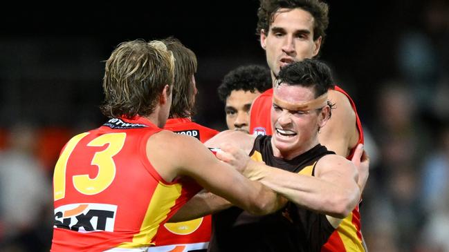 Hawk James Blanck wrestles with Jack Lukosius. Picture: Matt Roberts/AFL Photos/via Getty Images