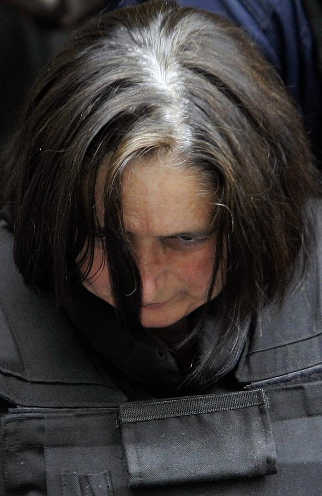 Monique Olivier — also protected by a bullet proof vest — outside a police headquarters in 2004. Picture: AFP