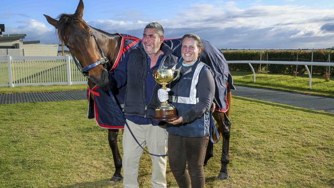 Murray Bridge trainers Dan Clarken and Oopy MacGillivray and Dan Clarken with the Melbourne Cup trophy and their horse The Map. Picture: Mark Brake