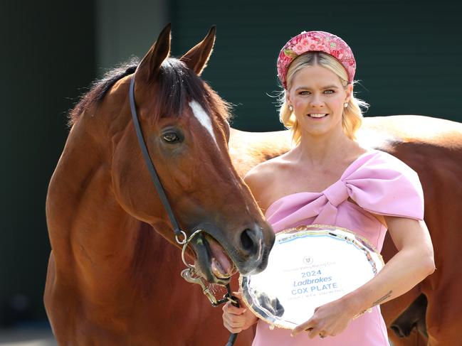 Olympic swimmer Shayna Jack cuddles up with Cox Plate fancy Docklands tasting the Cox Plate at Werribee Racecourse Quarantine Centre.                      Picture: David Caird