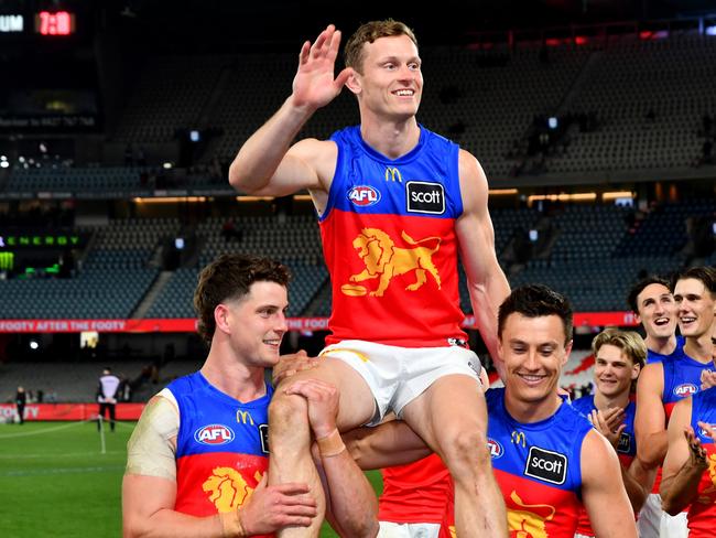 Ryan Lester of the Lions is chaired off the field after his 200th game during the round 21 AFL match between St Kilda Saints and Brisbane Lions. (Photo by Josh Chadwick/AFL Photos/via Getty Images)