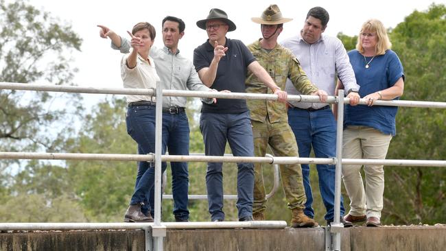 Thursday  February 6. Heavy rain causes flooding in North Queensland. The Prime Minister will visit Ollera Creek where the Australian Defence Force is delivering a temporary bridge structure to support rescue efforts. Emergency Management Jenny McAlister, Premier David Crisafulli, PM Anthony Albanese, Lieutenant Colonel Ryan Mitchell, Commanding Officer 3CER, Minister for Transport and Main Roads Brent Mickelberg on the rail bridge over the creek. Picture: Evan Morgan