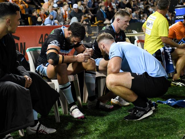 Toby Rudolf talks to the trainer after the John Bateman tackle.