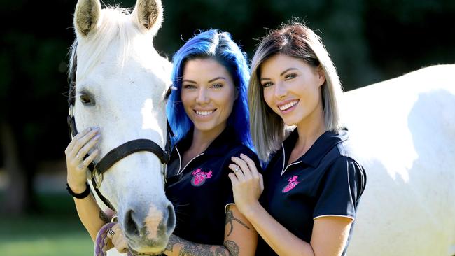 Gold Coast DJ twins, Brooke and Ellie Kelaart, founders of Project Ponies, a rescue and rehabilitation program for ill-treated horses destined for slaughter. Pictured with rescued horse Sadie. Picture: Mike Batterham