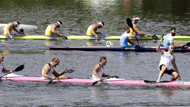 Germany's Max Rendschmidt, Tom Liebscher, Max Hoff and Marcus Gross celebrate their gold in the K4-1000m.