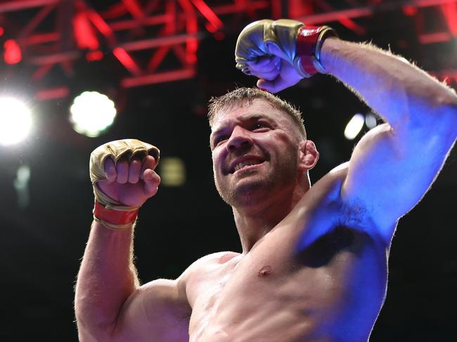 PERTH, AUSTRALIA - AUGUST 18: Dricus Du Plessis of South Africa celebrates winning his fight against Israel Adesanya of Nigeria by submission during UFC 305 at RAC Arena on August 18, 2024 in Perth, Australia. (Photo by Paul Kane/Getty Images)