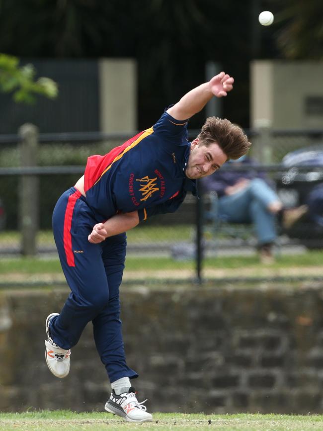 Mont Albert’s Andrew Padbury puts all his energy into a delivery. Picture: Hamish Blair