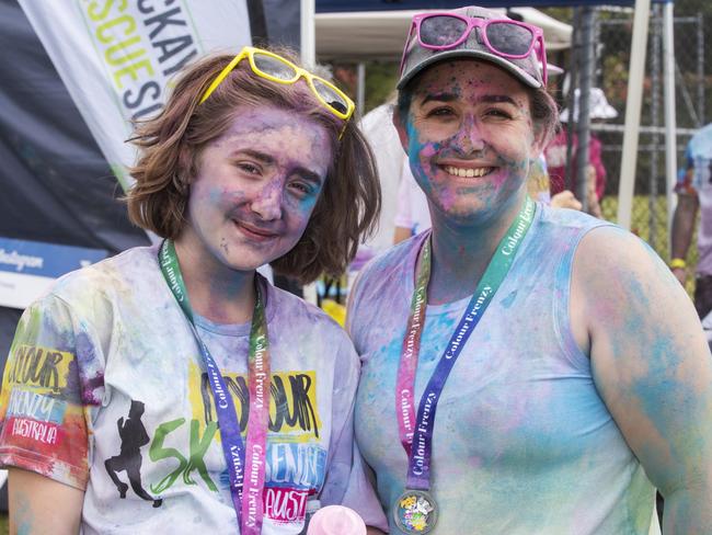 Naraya Smith and Krystal James from Slade Point at the Mackay Colour Run 2021. Picture: Michaela Harlow