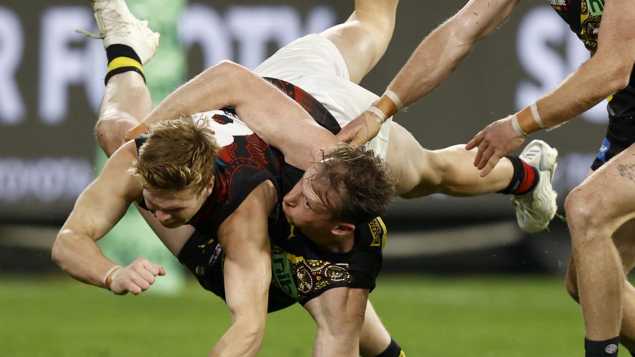 Dylan Grimes tackles Ben Hobbs on Saturday night. Picture: Darrian Traynor/Getty Images
